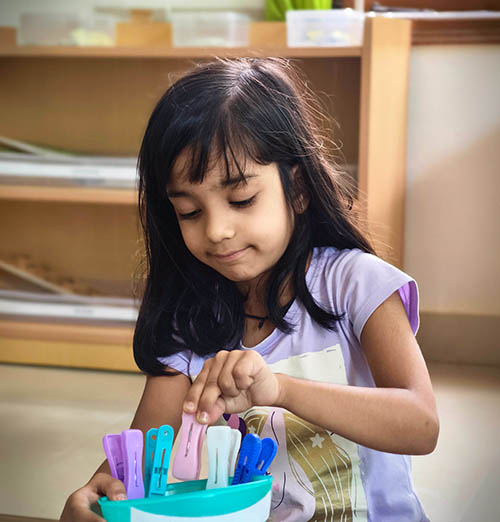 Child engaged in hands-on learning